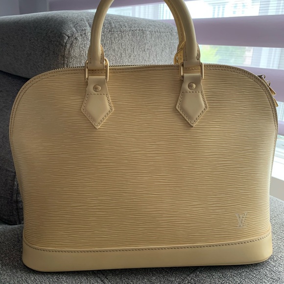 AUTHENTIC LOUIS VUITTON ALMA PM IN EPI (VANILLA) - Picture 1 of 10